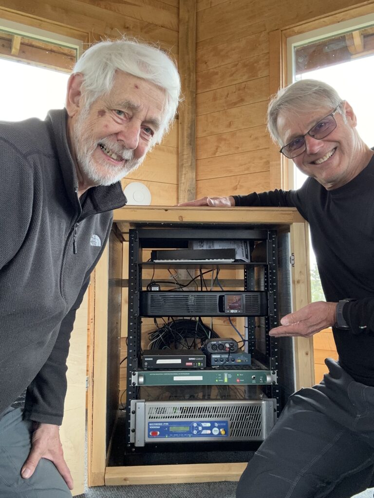 Mike and Cary with the UPS installed in the equipment rack.